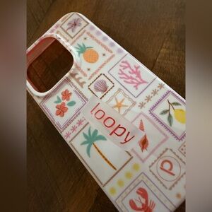 Loopy Tropical Pattern iPhone 15 Pro phone Case (right hand)